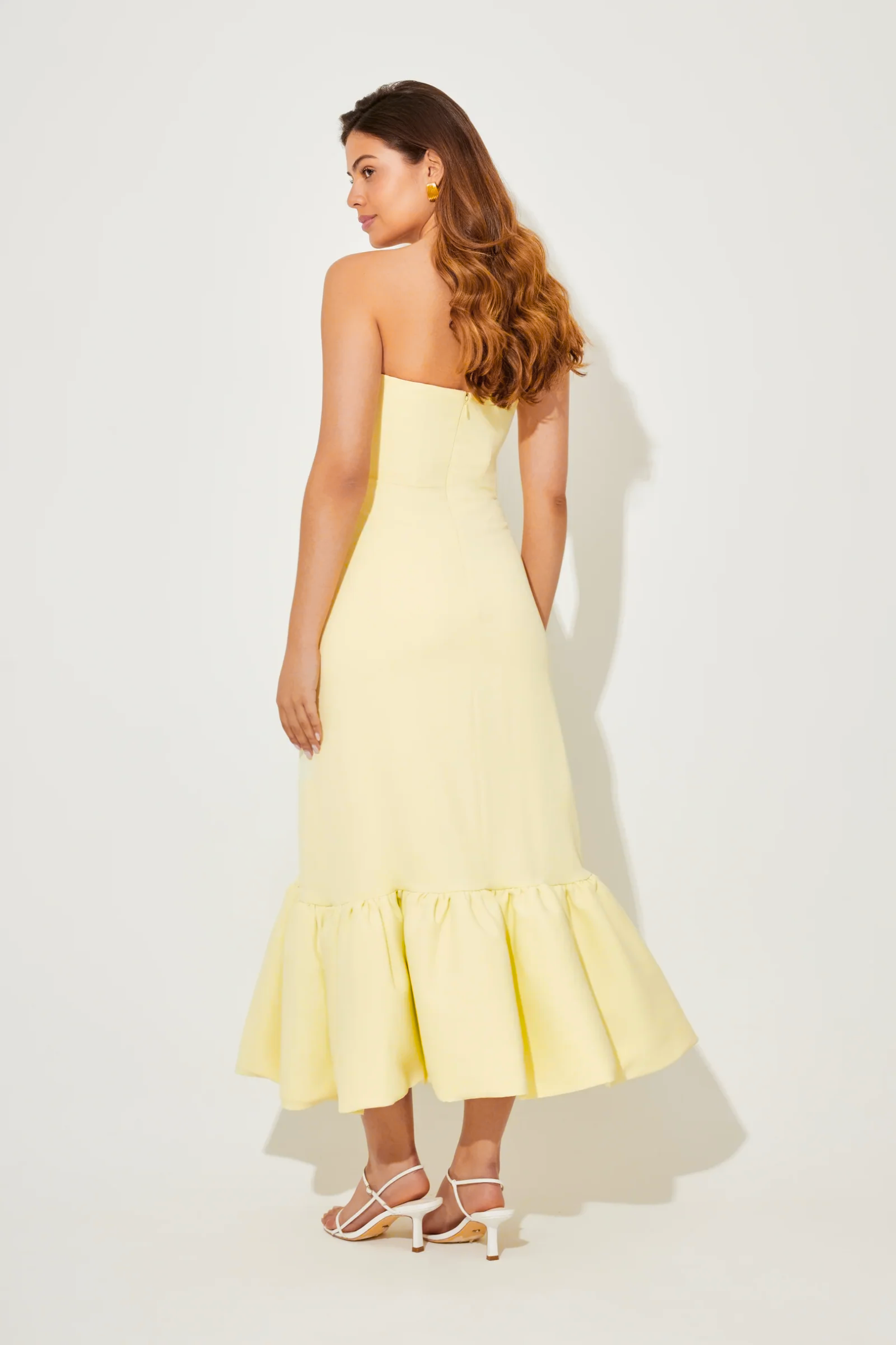 The July Muse Strapless Peplum Hem Midi Dress