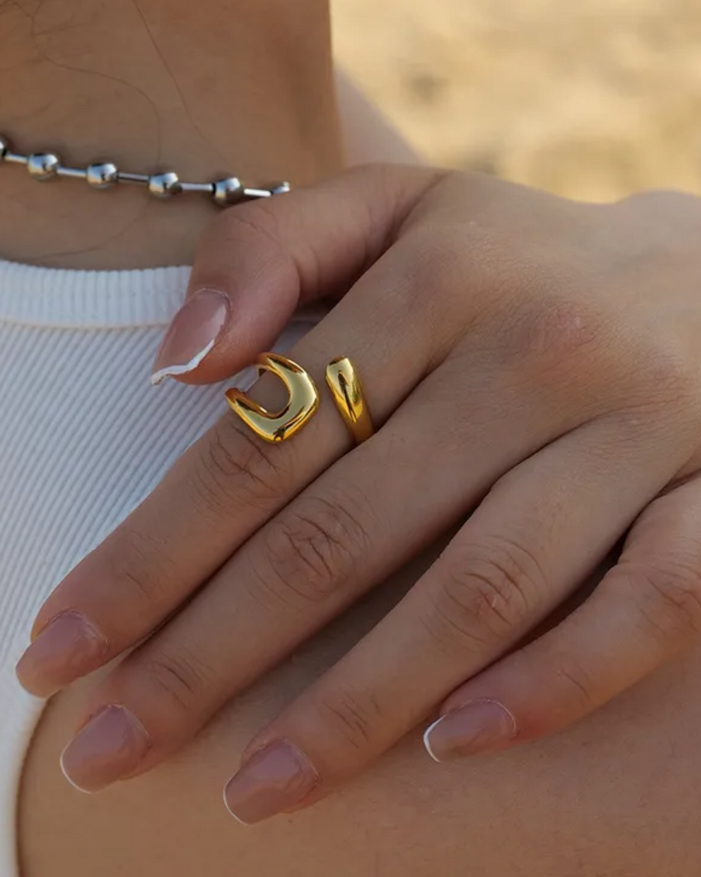 Twisted loop ring