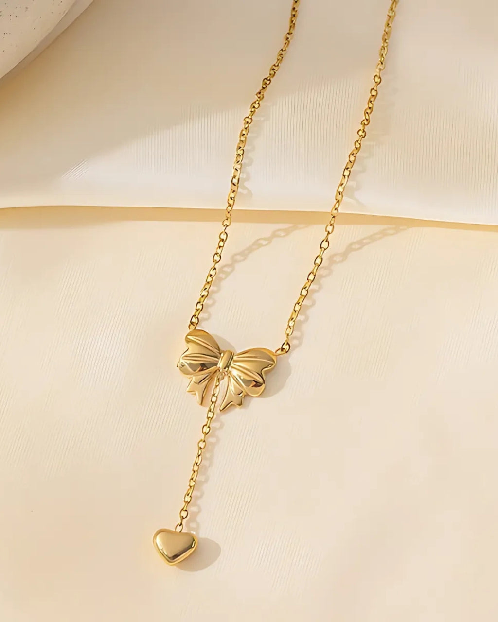 bow heart necklace