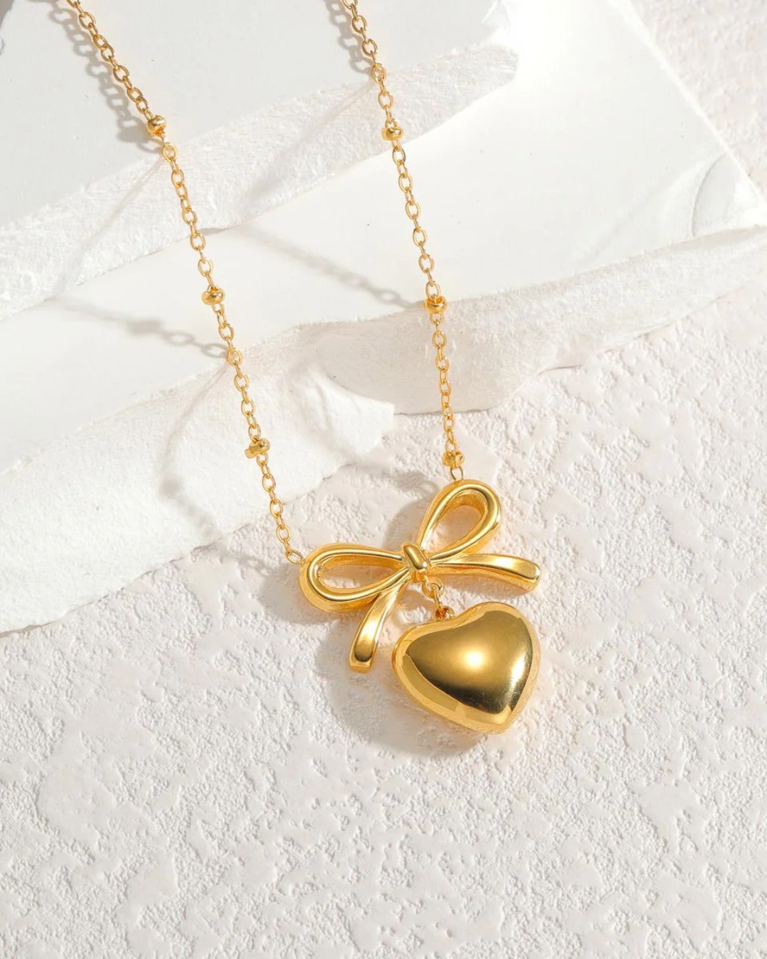 Heart bow necklace