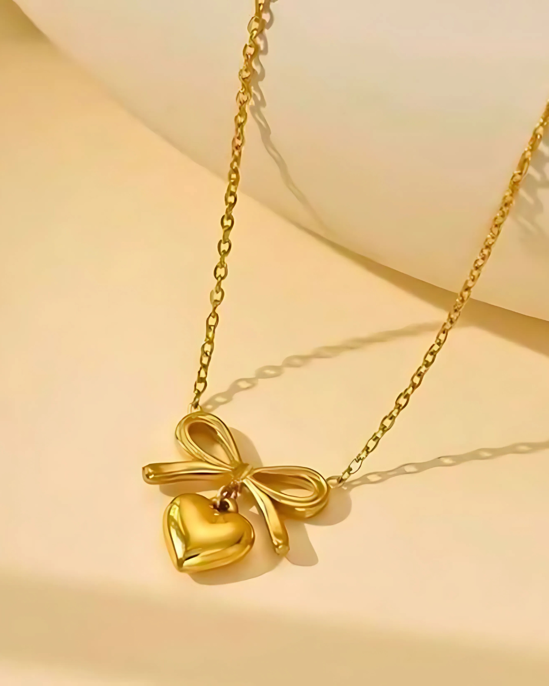 Heart bow necklace