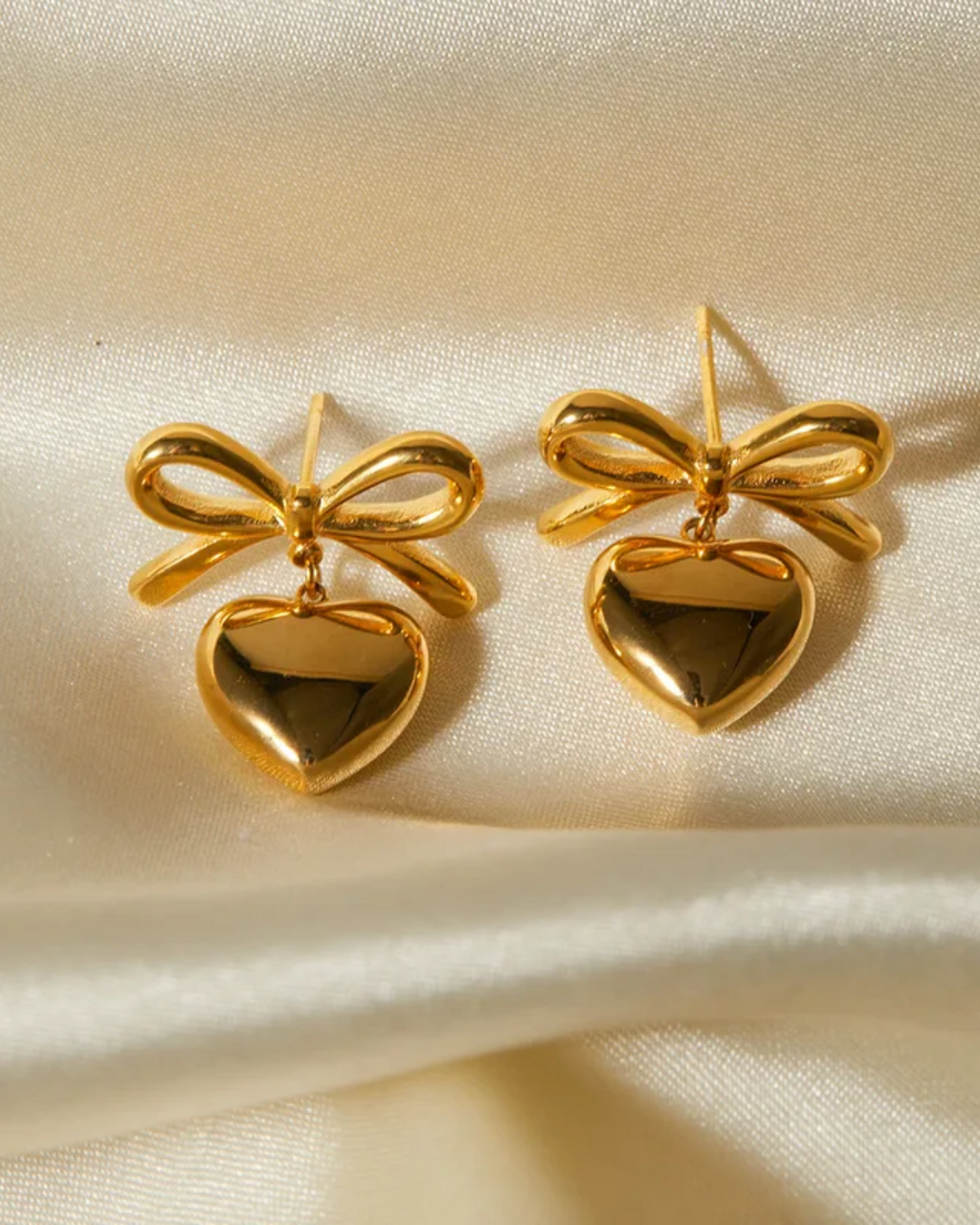 bow heart earring